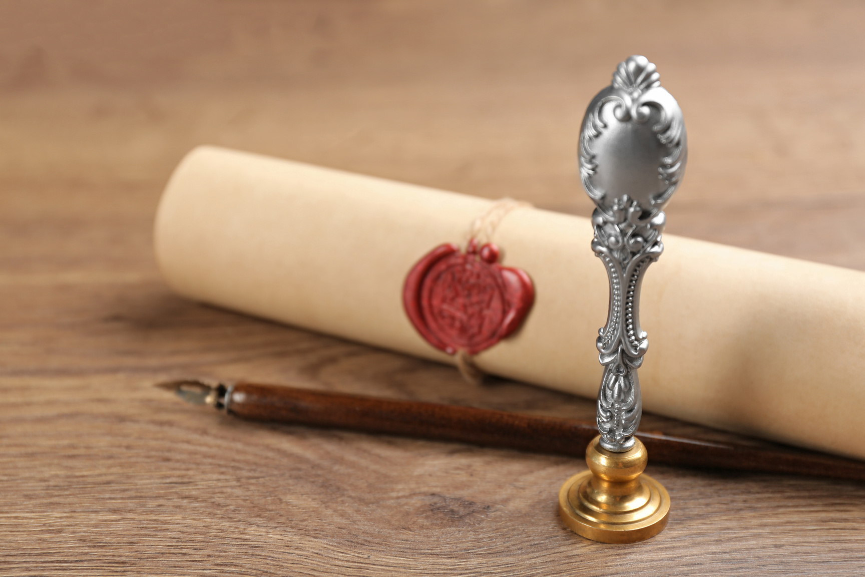 Notary's Public Pen and Document with Wax Stamp on Wooden Table, Closeup